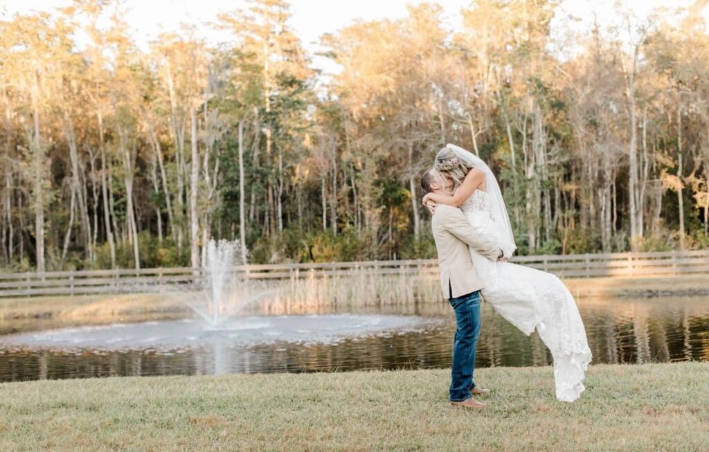 wedding couple at the pond ceremony