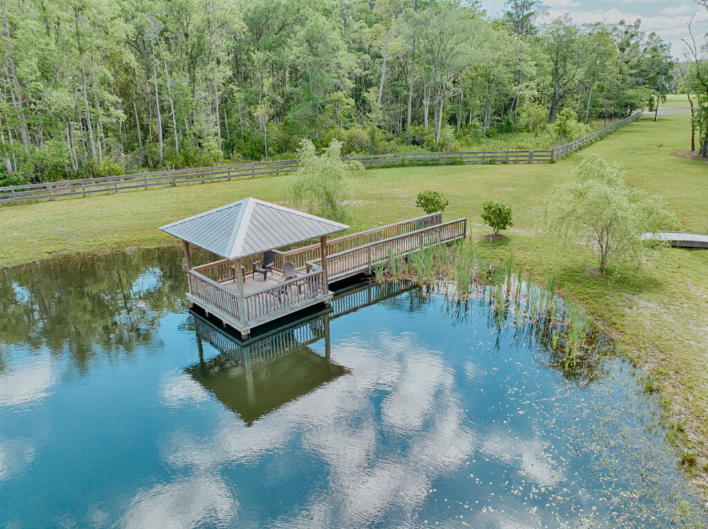 the pond ceremony option at belle oaks barn