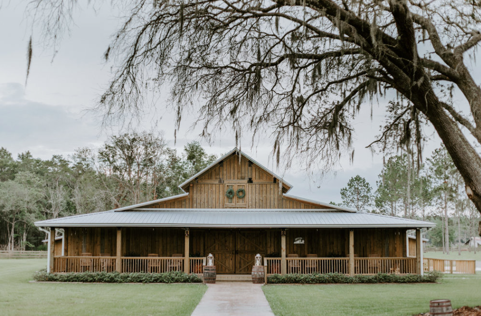 daytime photo of the main barn at belle oaks farm