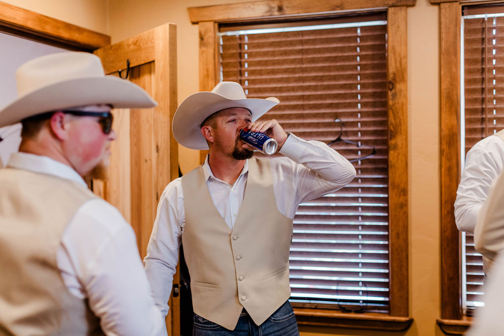 groom drinking a beer