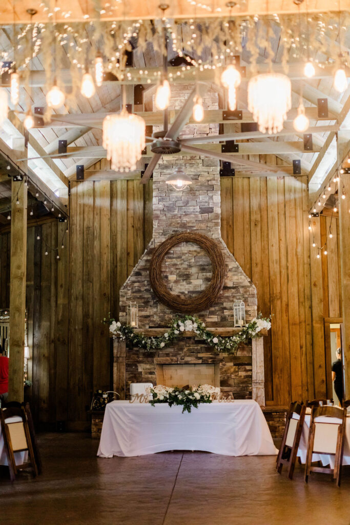 wooden fireplace inside barn venue