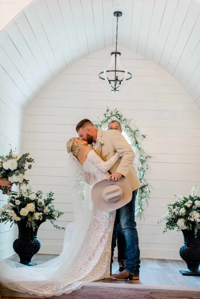 bride and groom's first kiss