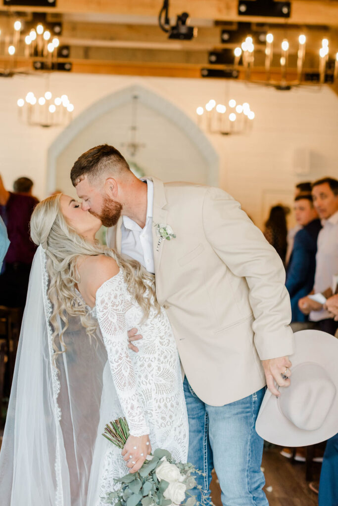 bride and groom kissing