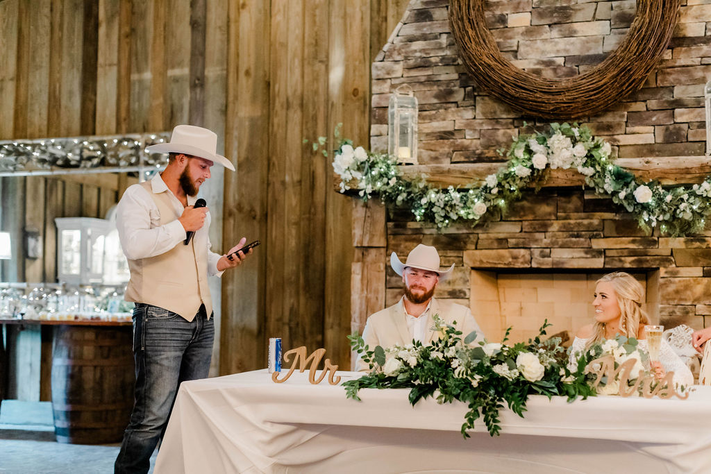 best man giving speech at wedding reception