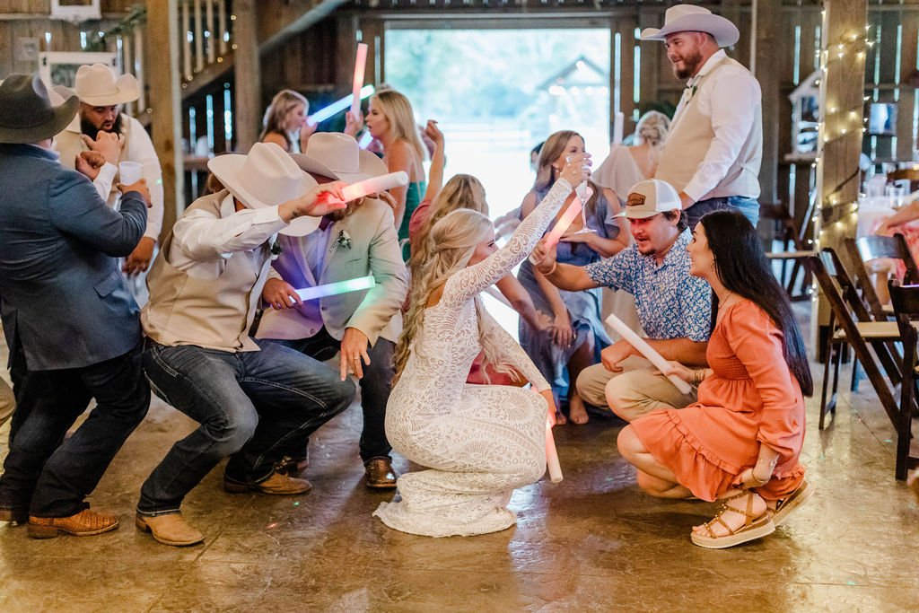 bride and wedding guests dancing